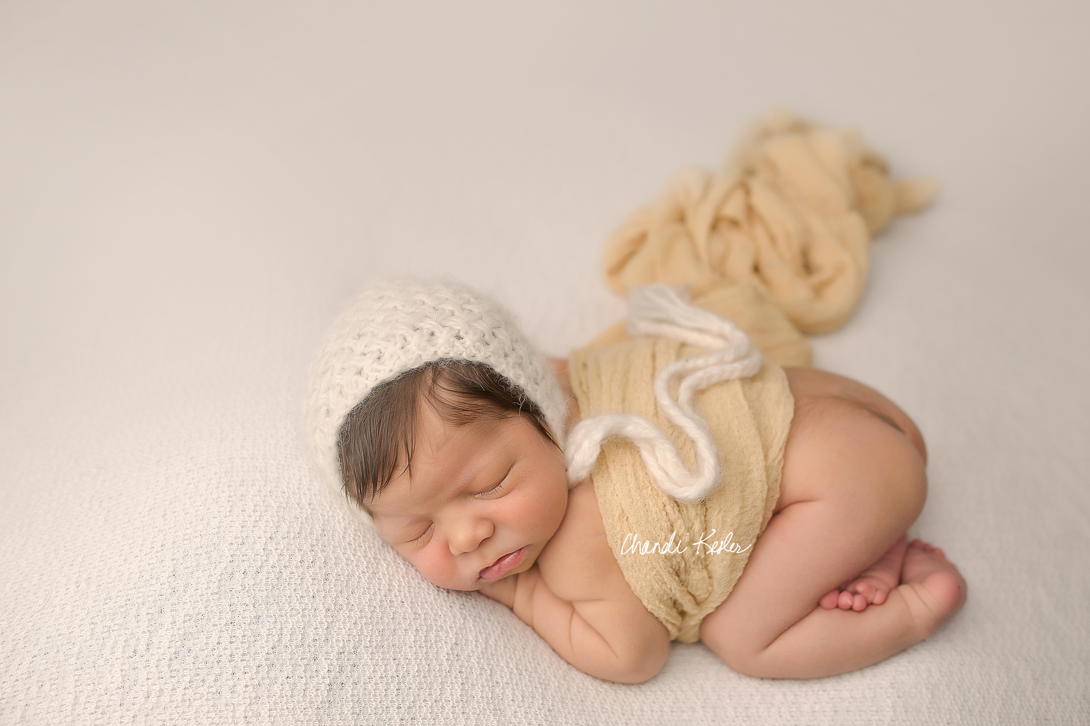 Clinton IL Newborn Photographer | Newborn Girl session with blues and yellows | Chandi Kesler Photography